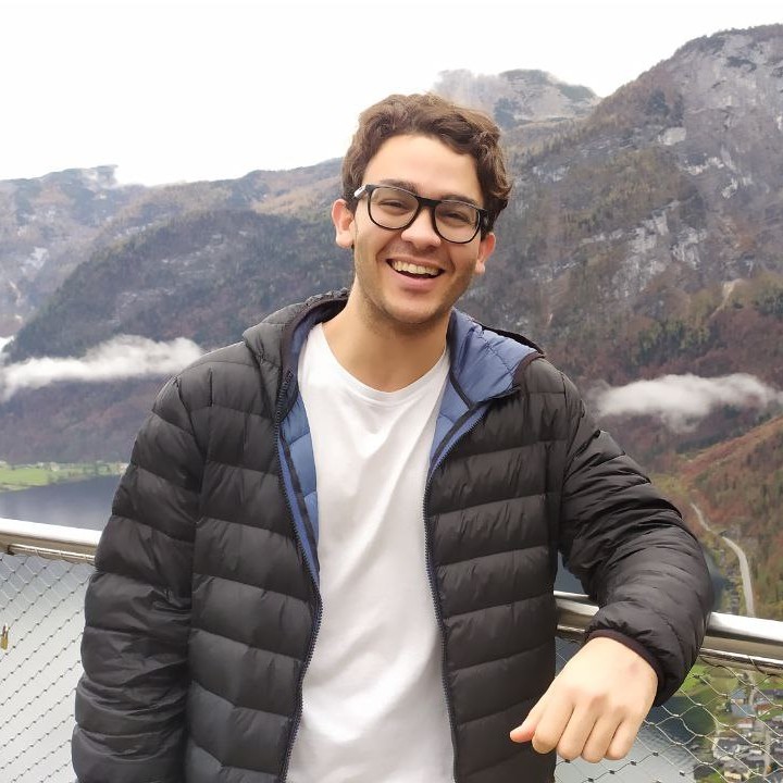smile at the camera